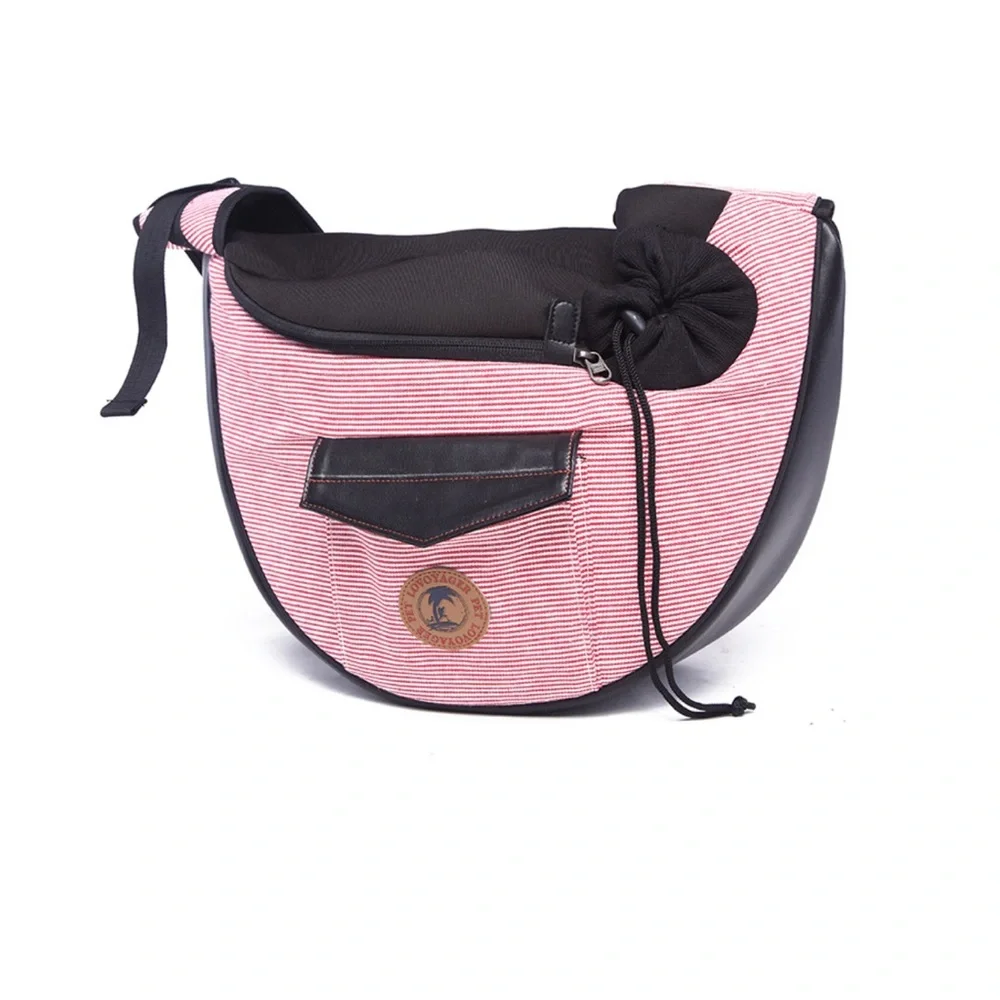 Pet carrier bag strap has a cell phone holder. The strap is padded like new.